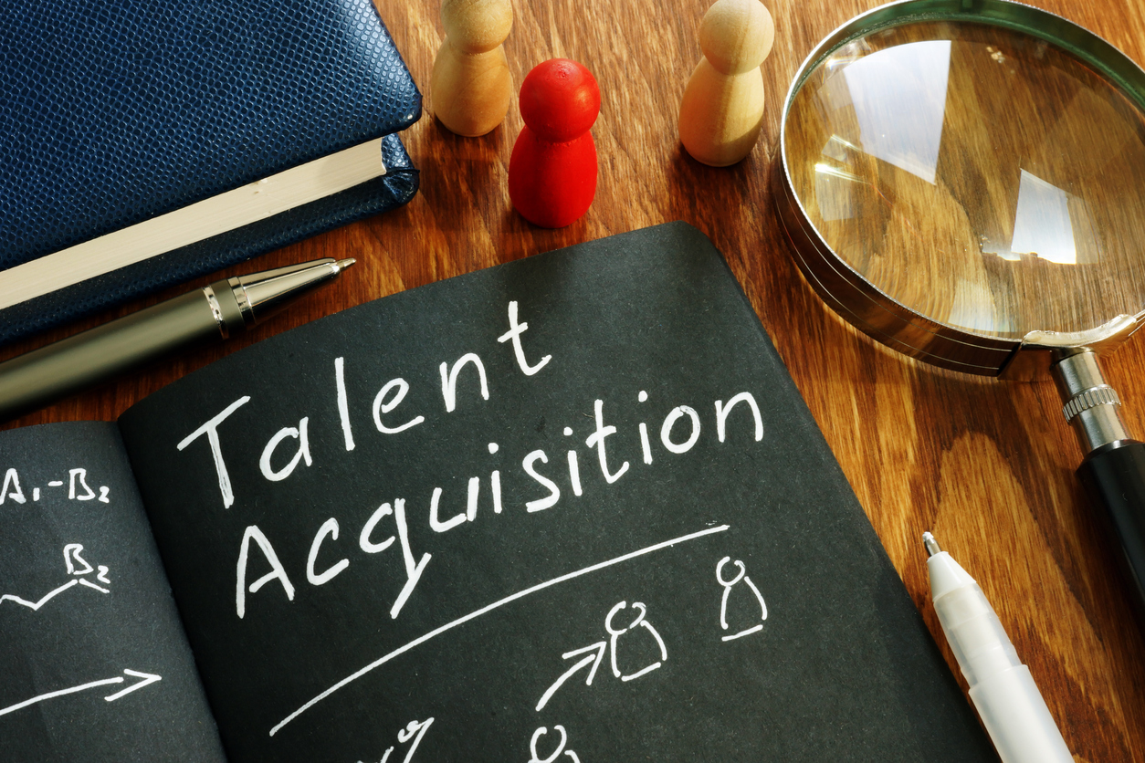 A book with the words talent acquisition written on it.